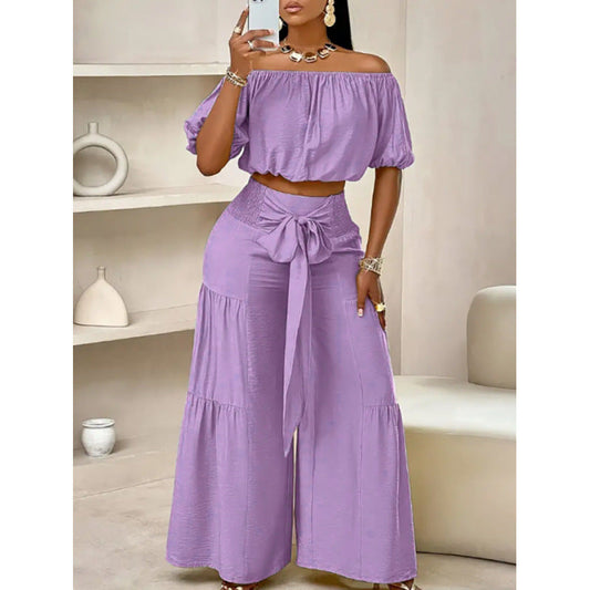 High-waisted Solid-color Flared Pants With Tie Detailing And A Flowing Drape