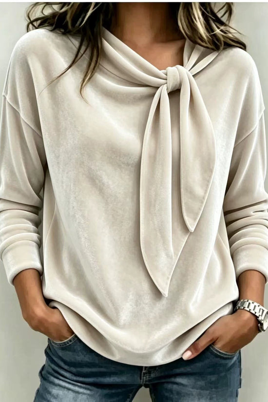 Solid color long sleeved bow top 