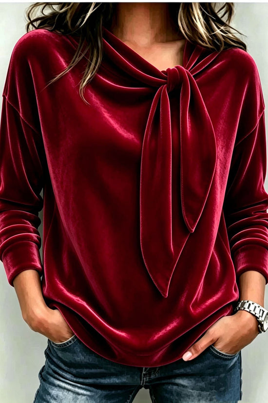 Solid color long sleeved bow top 