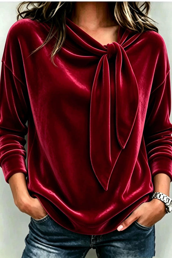 Solid color long sleeved bow top 