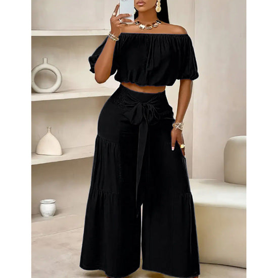 High-waisted Solid-color Flared Pants With Tie Detailing And A Flowing Drape 