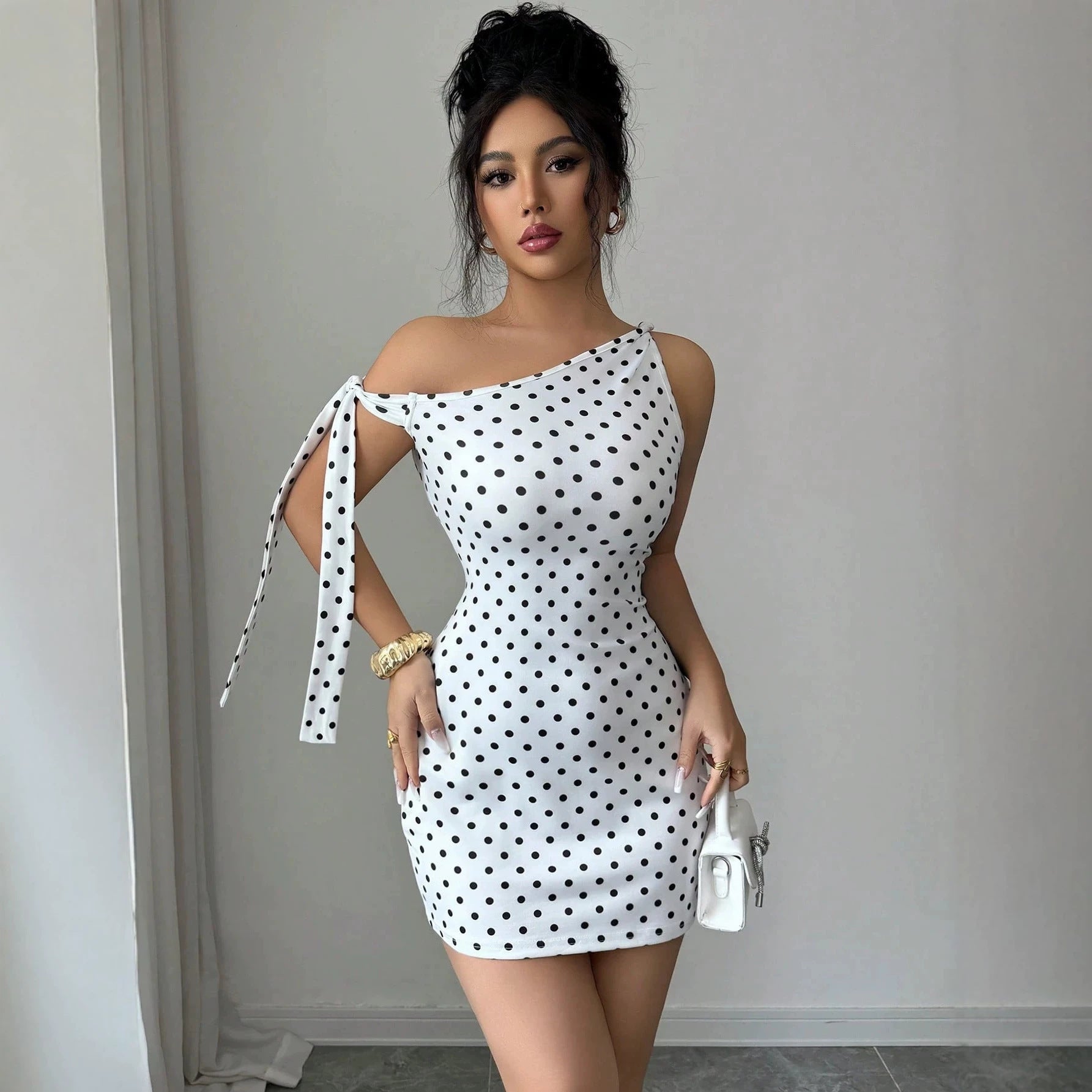 Wave point sloping shoulder strap slim fit hip hugging jumpsuit short skirt for women 