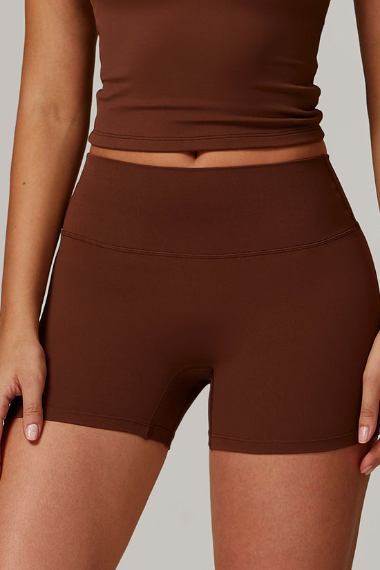 Shaved tight yoga shorts for women, high waisted and waist cinching fitness pants, hip lifting and running sports shorts 