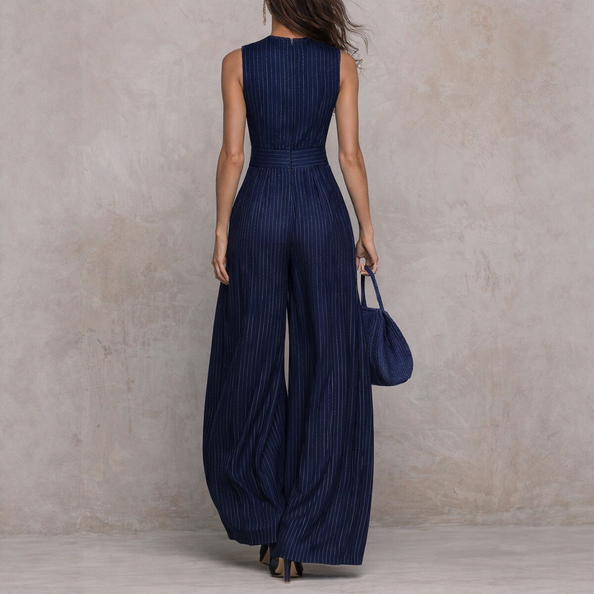 Deep blue striped sleeveless waist cinched wide leg jumpsuit 
