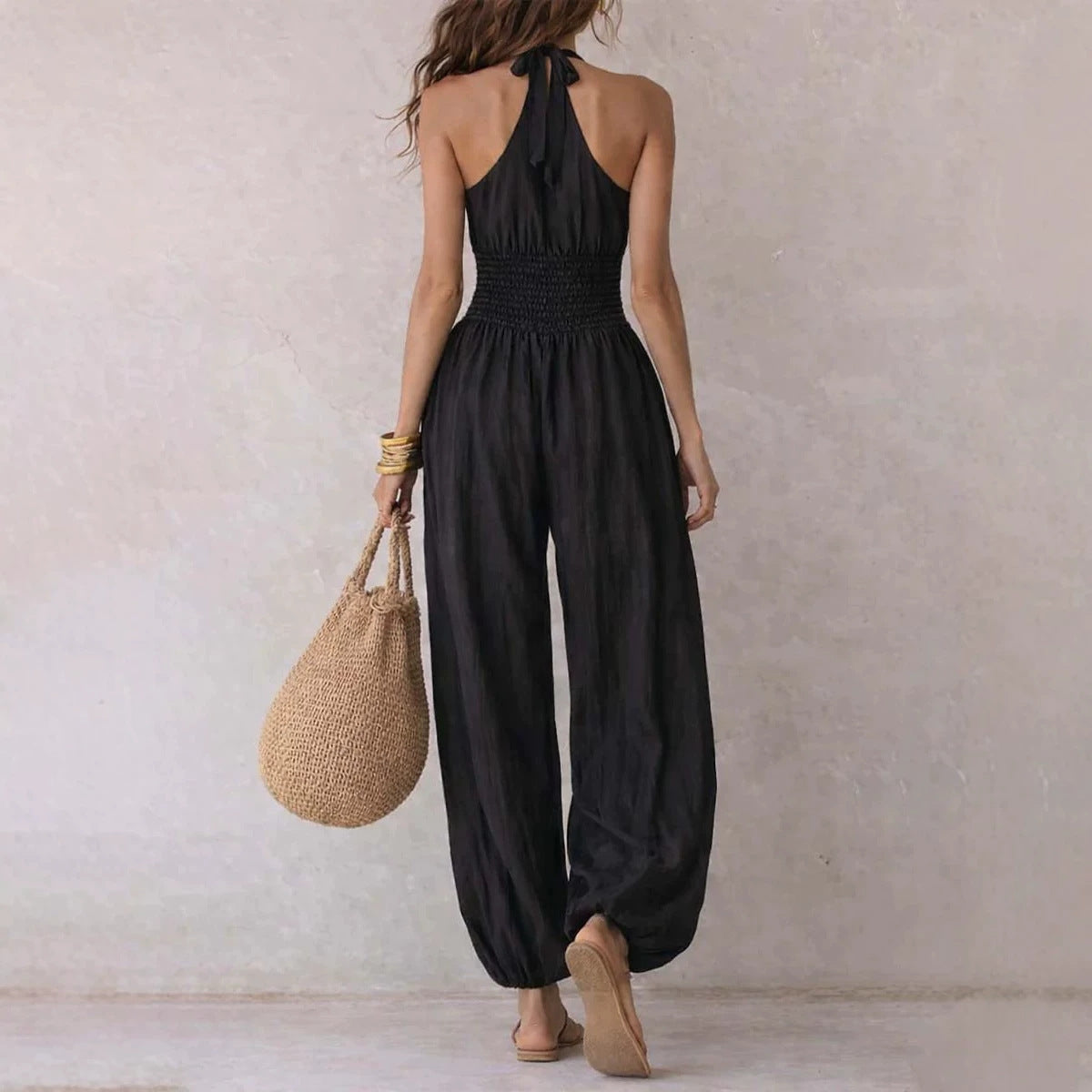 Sleeveless hanging neck backless high waisted jumpsuit 