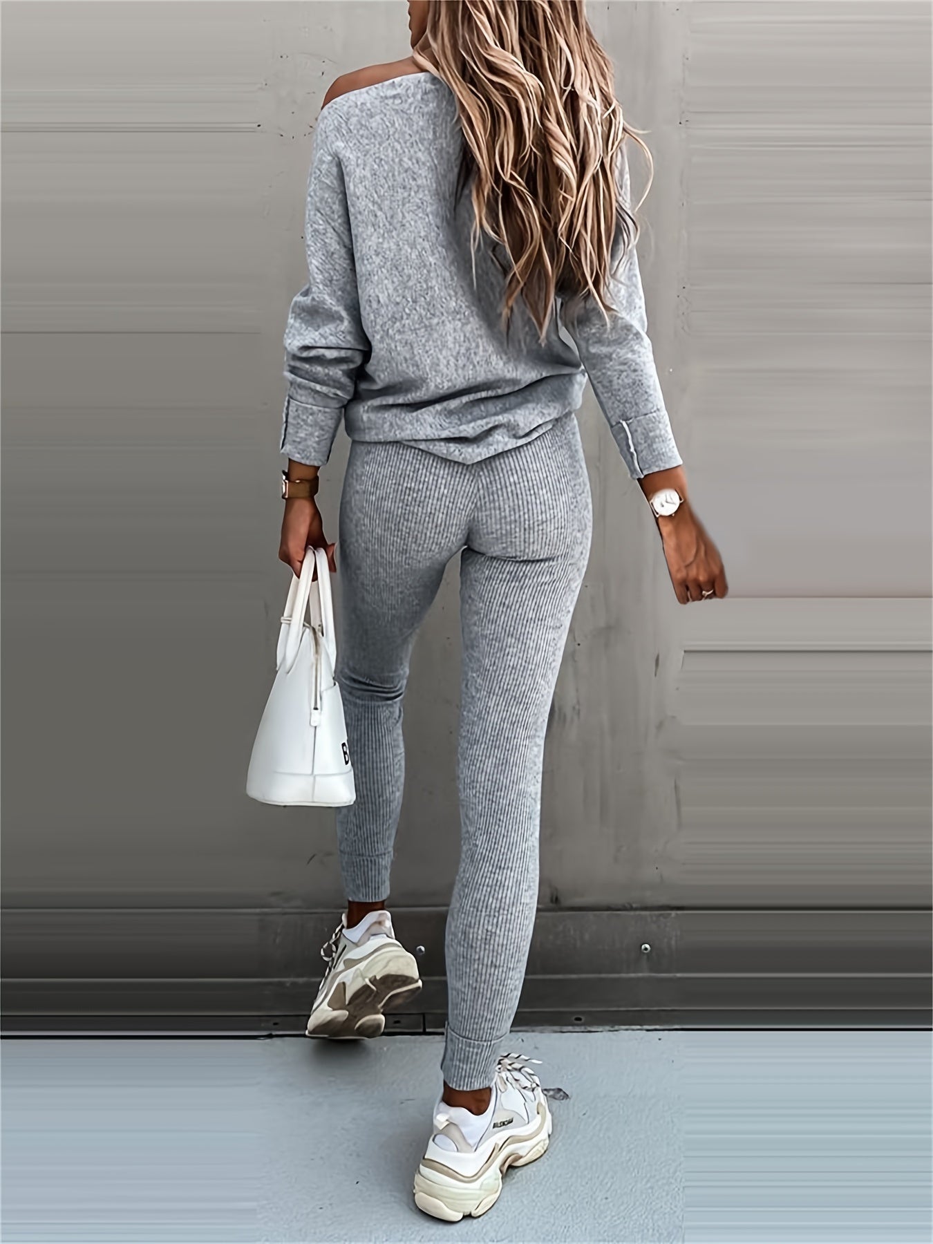 Casual Two-Piece Outfit Featuring A Long-Sleeve Pullover And High-Waisted Drawstring Pants 